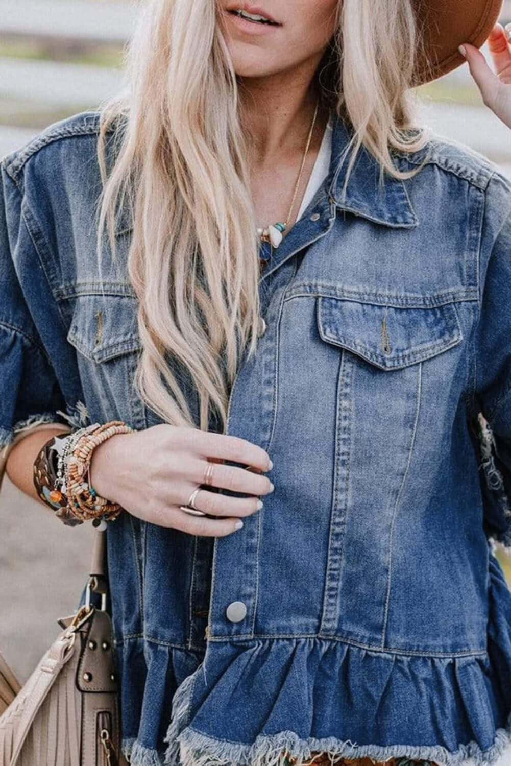 Captivated By You Jacket | Trendy Denim Style by Teal Tiger Boutique $48.00 Discover comfort and style with the Captivated By You denim jacket. This trendy boutique item features playful ruffled sleeves and an edgy raw hemline. Teal Tiger Boutique