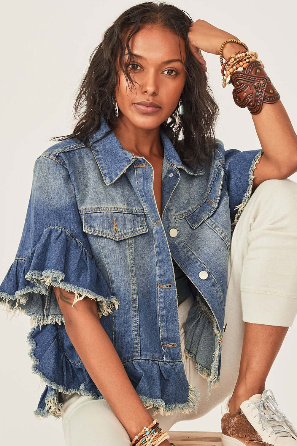 Captivated By You Jacket | Trendy Denim Style by Teal Tiger Boutique $48.00 Discover comfort and style with the Captivated By You denim jacket. This trendy boutique item features playful ruffled sleeves and an edgy raw hemline. Teal Tiger Boutique