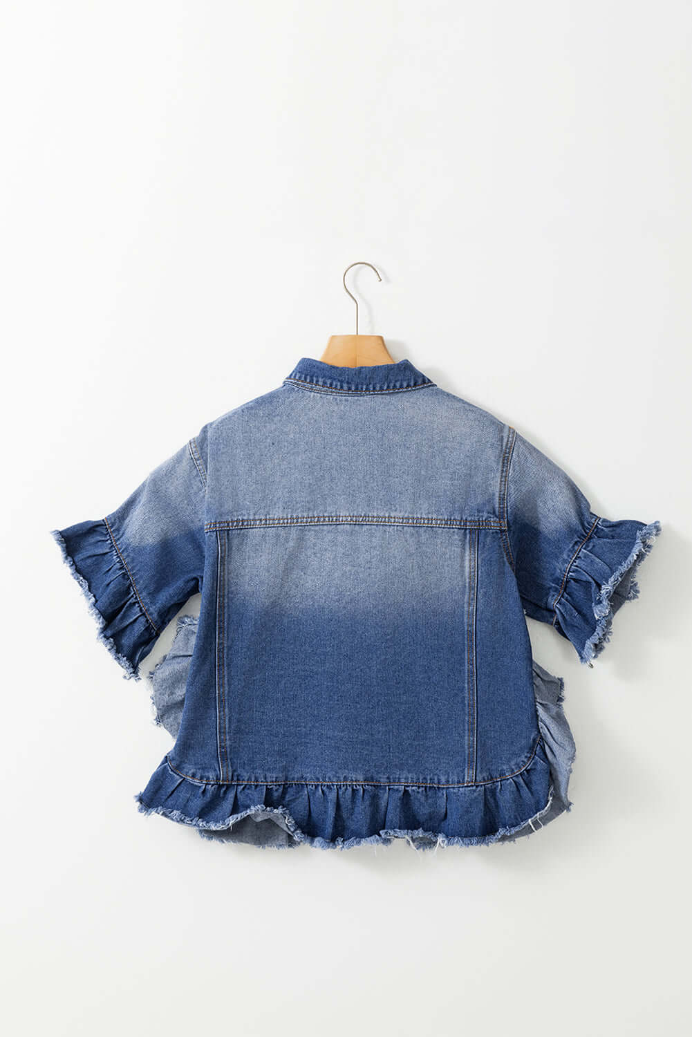 Captivated By You Jacket | Trendy Denim Style by Teal Tiger Boutique $48.00 Discover comfort and style with the Captivated By You denim jacket. This trendy boutique item features playful ruffled sleeves and an edgy raw hemline. Teal Tiger Boutique