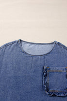 Denim Darlin Top with 3/4 sleeves and chest pocket, made from 100% cotton fabric.