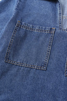 Close-up of the Blue Jean Breeze Dress's oversized patched chest pocket in soft denim fabric.