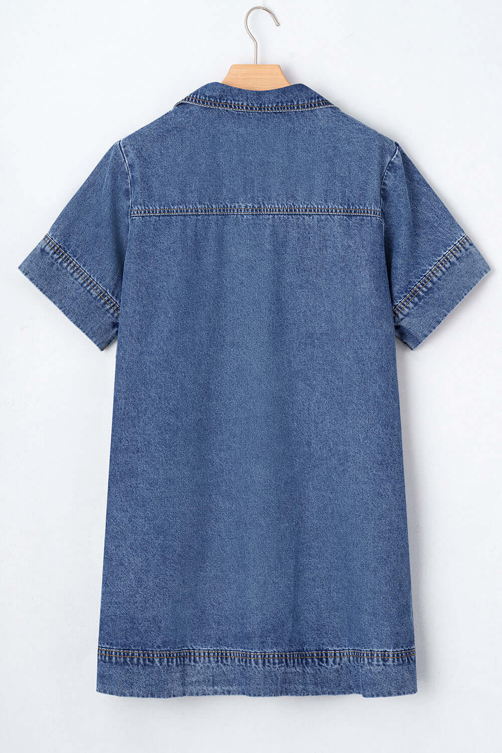 Back view of Blue Jean Breeze Dress showcasing its relaxed fit and denim fabric.