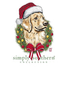 Adorable dog wearing a Santa hat and festive wreath with Simply Southern logo, featuring a red bow, on a white background.