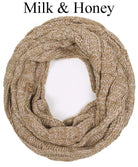 Cozy C.C Fable Infinity Scarf in Milk & Honey color with a stylish cable knit design. Perfect for warmth and style.