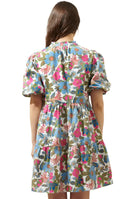 Back view of the Jacey Dress by Sugarlips featuring vibrant floral print and a playful Babydoll silhouette.