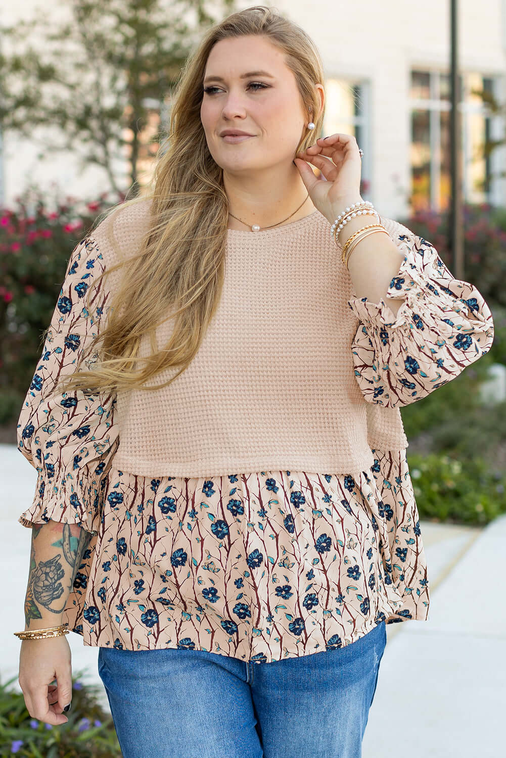 Plus size SLIP AWAY top featuring floral print, flounce sleeves, and knit patchwork details, perfect for any occasion.