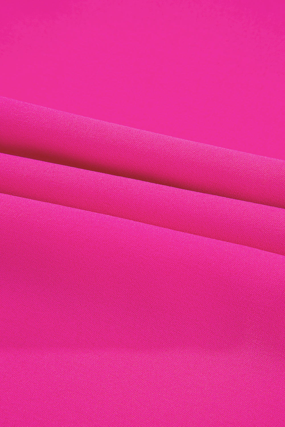 Vibrant hot pink fabric ideal for the Berry Brilliance Plus Size V-Neck Top, showcasing its stylish texture.