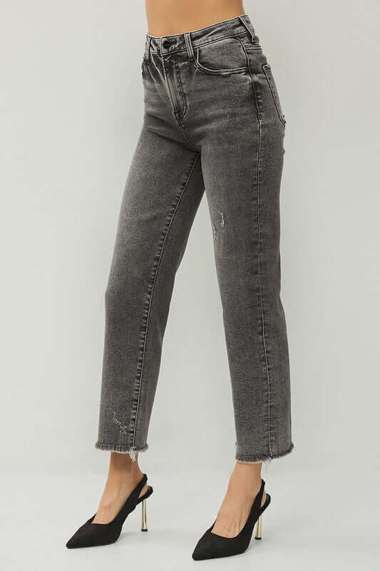 RISEN Veronica Jeans in acid wash black, high rise straight leg with frayed hem, worn with black heeled mules.