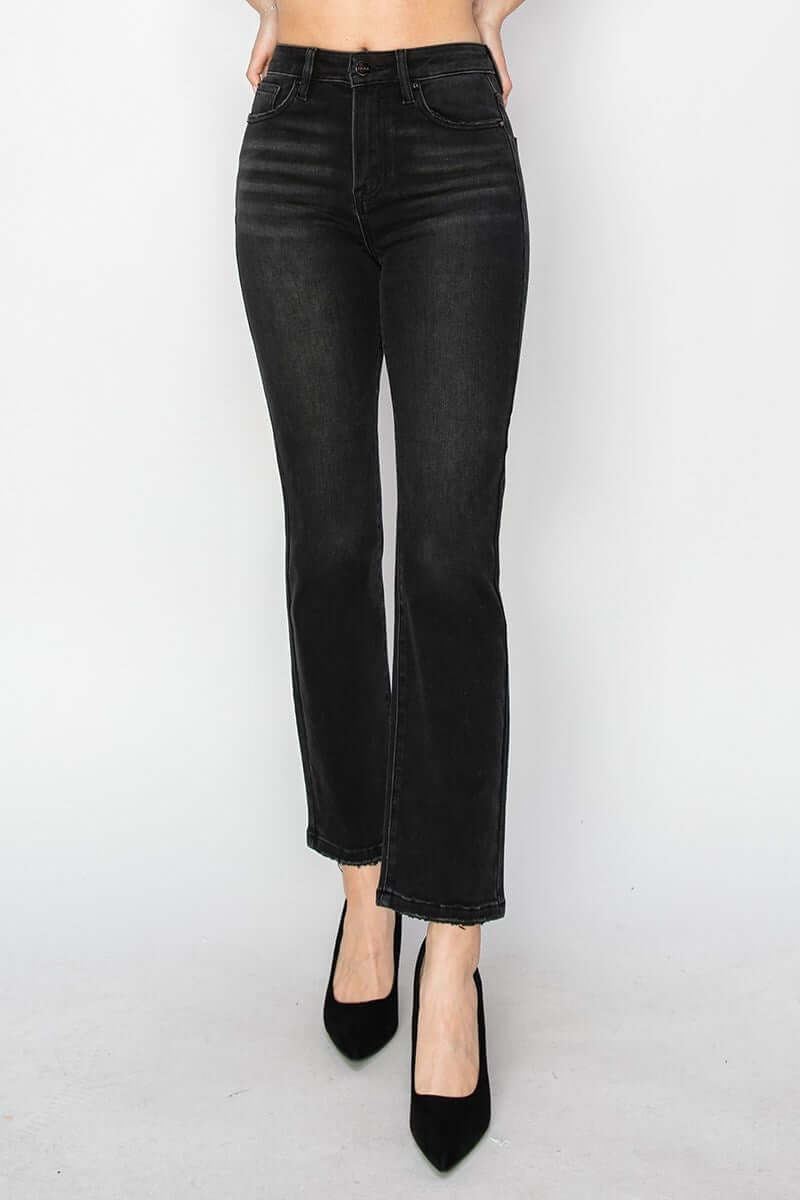 Model wearing PIPER JEANS by Risen Denim, black high-waisted straight leg jeans with a sleek design.