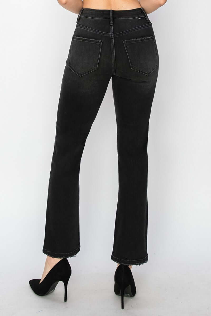 Back view of jet black PIPER JEANS by Risen Denim, featuring a high waist and straight leg design.