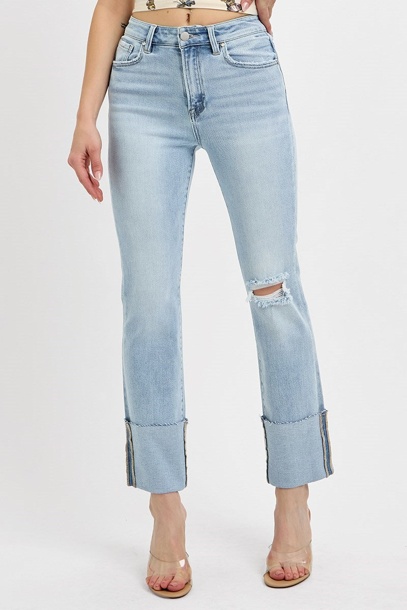 RISEN VANESSA JEANS showcasing a stylish design with high rise and wide cuffs, perfect for a modern look.