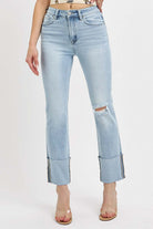 RISEN VANESSA JEANS in light wash featuring a high rise, wide cuff, and stylish distressed details.