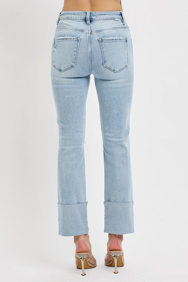 Back view of RISEN VANESSA JEANS showcasing high rise and wide cuff design in light blue.