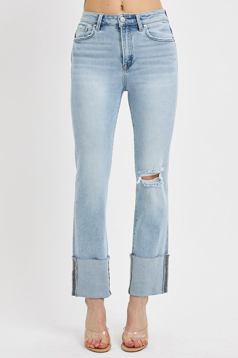 RISEN VANESSA JEANS in light wash denim with wide cuffs and distressed details for a stylish look.