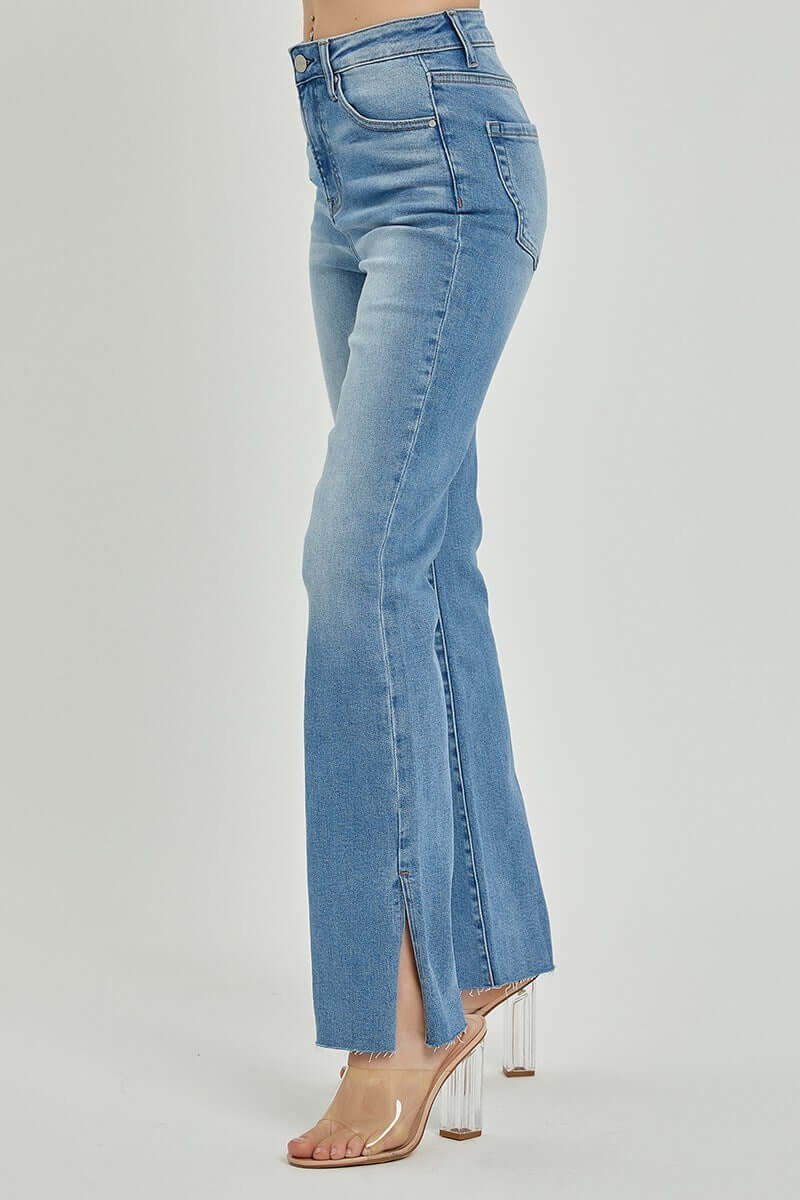 SHILO bootcut jeans by Risen in medium wash with raw hem and side split, showcasing stylish comfort.
