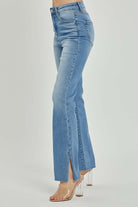 "SHILO Bootcut Jeans by Risen with high rise and side split detail in medium wash denim"