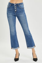 High rise button fly RISEN JOSIE JEANS with straight leg, showing retro cropped bootcut style and durable denim fabric.