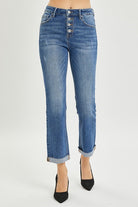 High-rise button fly straight leg Risen Josie Jeans with cropped bootcut style showcasing women's footwear.