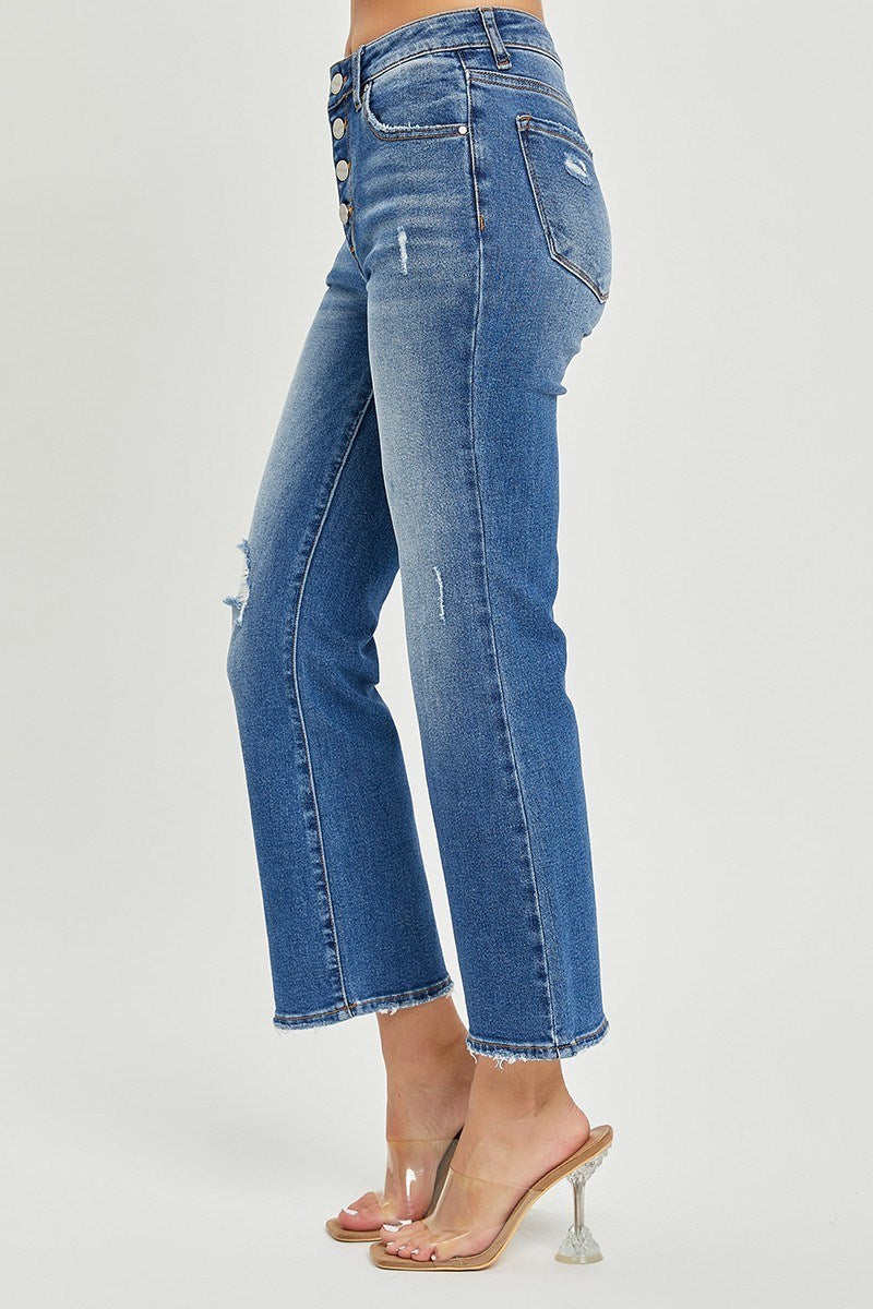 Risen Kelsey Midrise Jeans with button-down front and cropped flare leg, showcasing modern style and comfort on a light background.