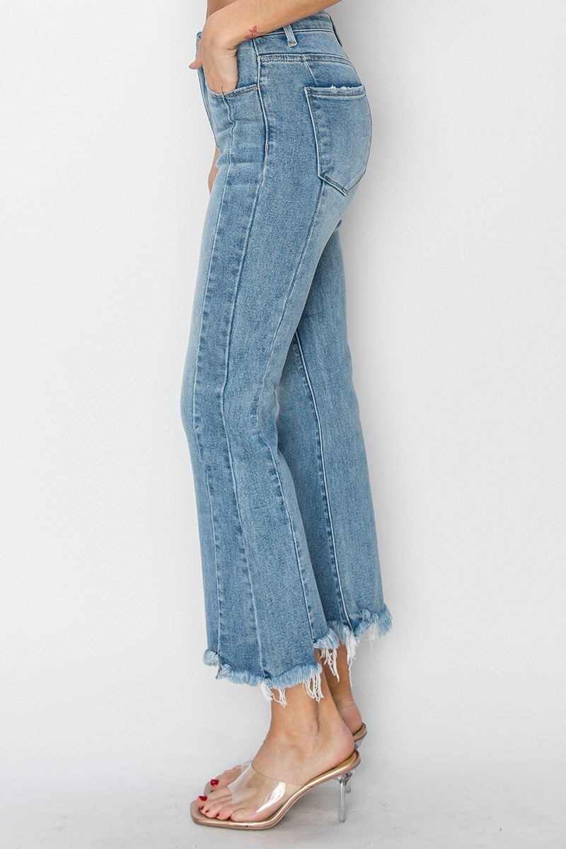 Risen Betina high rise ankle flare jeans with step hem detail, perfect for adding a playful touch to outfits.