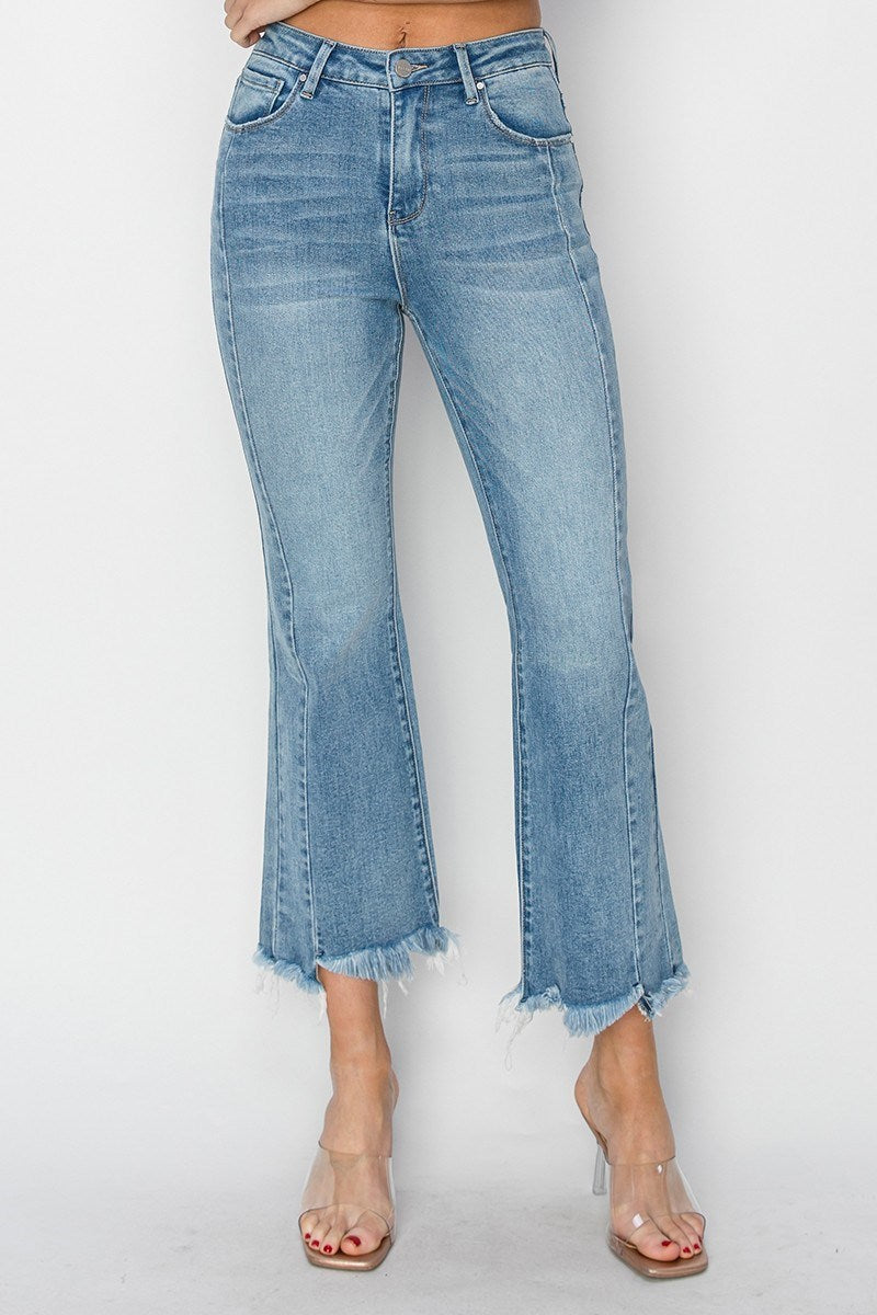 Risen Betina High Rise Ankle Flare Jeans with step hem detail in light wash denim.