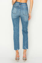 Back view of Risen Celeste high-rise distressed slim straight jeans, showcasing a stylish fit and contemporary design.