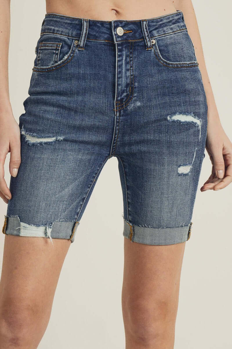 Risen Shayleigh Bermuda Shorts in distressed denim with rolled cuffs and a flattering high-rise fit.