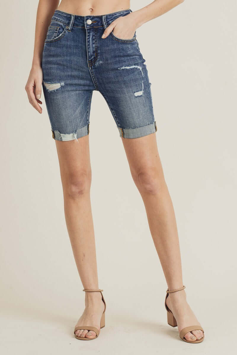 Risen Shayleigh Bermuda Shorts in distressed denim with cuffed hem for stylish summer wear.