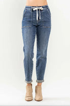 Judy Blue Jane Plus Size Joggers in medium dark wash with elastic drawstring waist and cuffed hems.