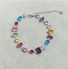 Gemstone Cascade Bracelet featuring vibrant cubic zirconia gems in silver, showcasing a luxurious design.