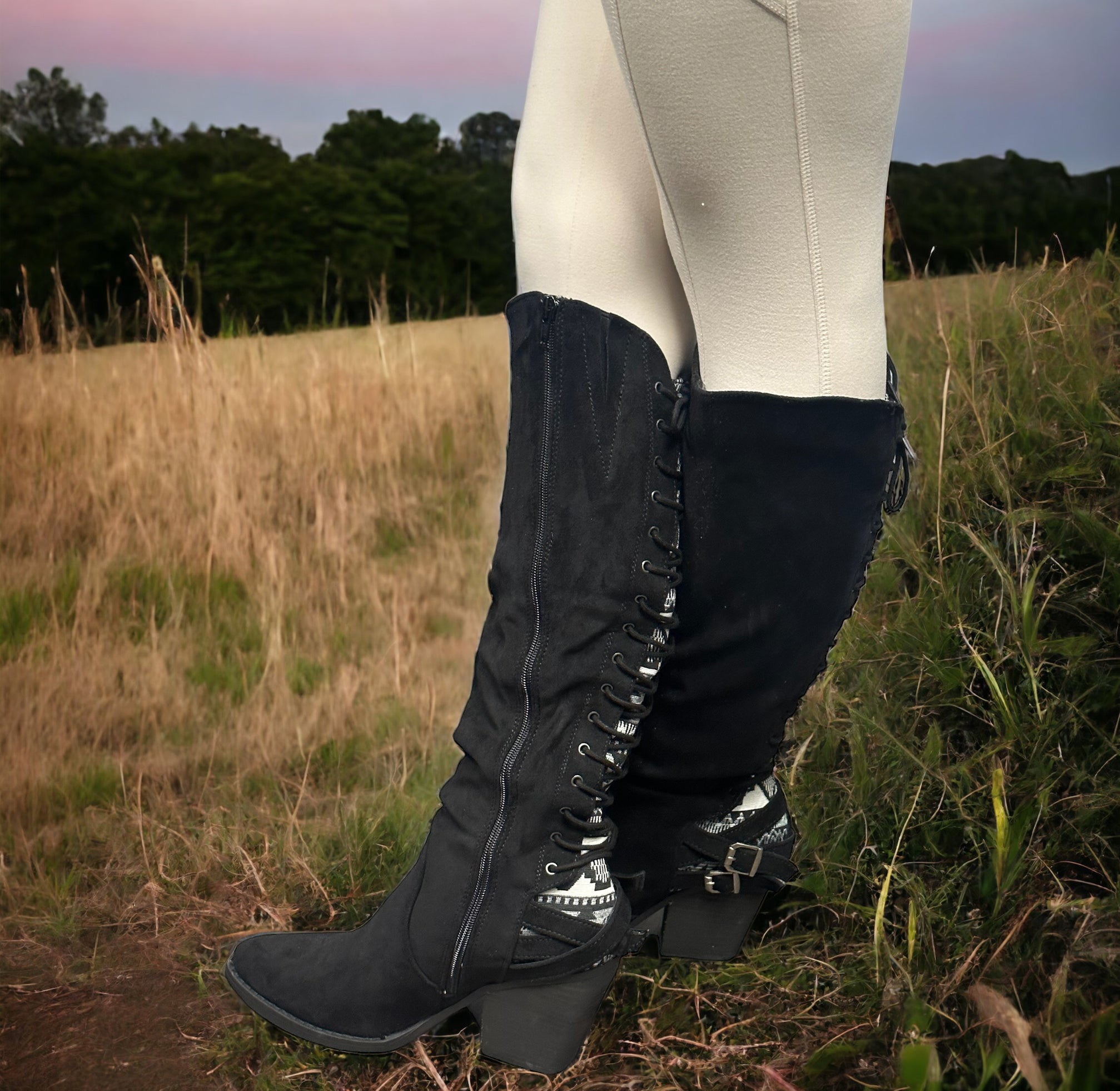 ROMERO BOOTS BY VERY G in BLACK by Very G $36.00 The way these black beauties lace up in the back, showcasing an Aztec design - it's absolutely flawless! The suede feels so soft and draws you in effortlessly. Plus, the wood block heel offers immense comfo