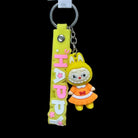Labubu Keychain in yellow with 'happy' wristlet and mini doll. Perfect for adding fun to keys or bags.
