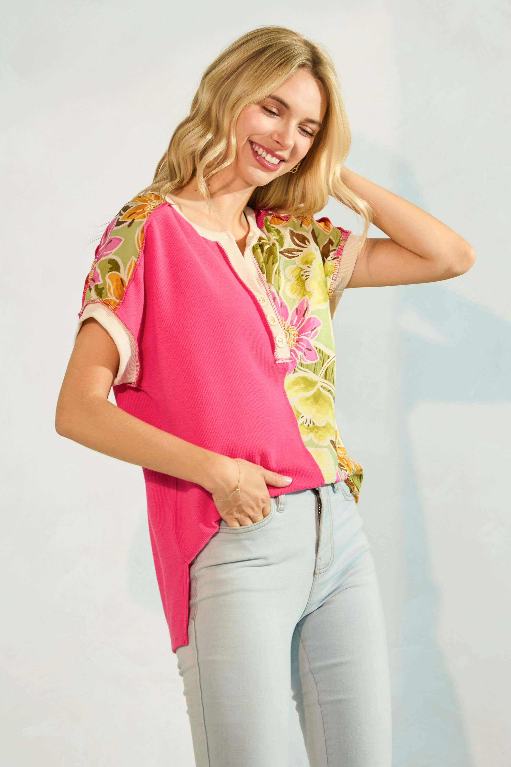 Fuschia floral colorblock ribbed tee, relaxed fit with button-front, perfect for a stylish weekend getaway.