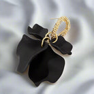 Elegant BLACK RUFFLES Earrings by Vivian-Lu featuring stylish black ruffle design and sparkly gold tone circle.