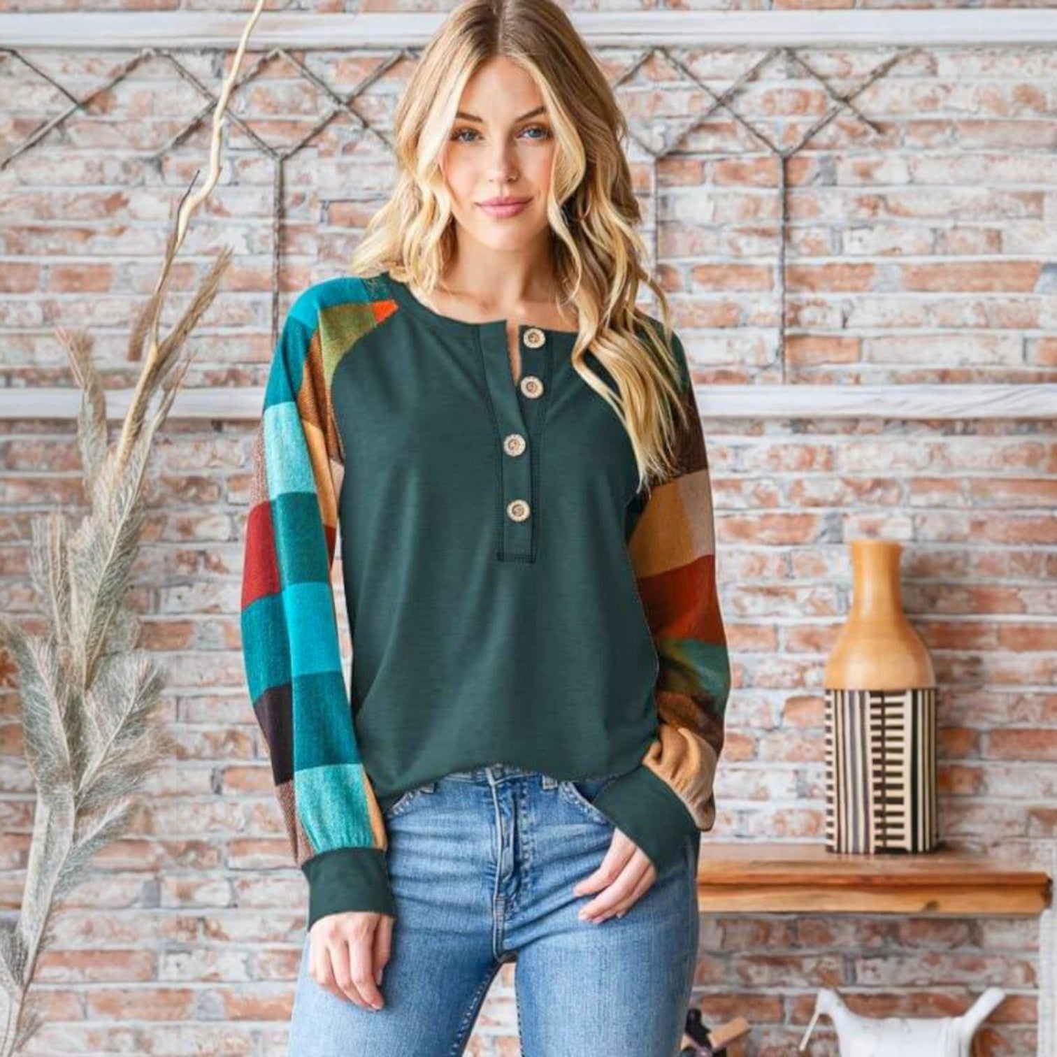 HIGHLAND RETREAT TOP in green with plaid sleeves, perfect for cozy and stylish fall outfits.