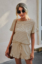 Model wearing French Market Shorts Set with striped design, ruffled sleeves, and relaxed fit for stylish lounge wear.