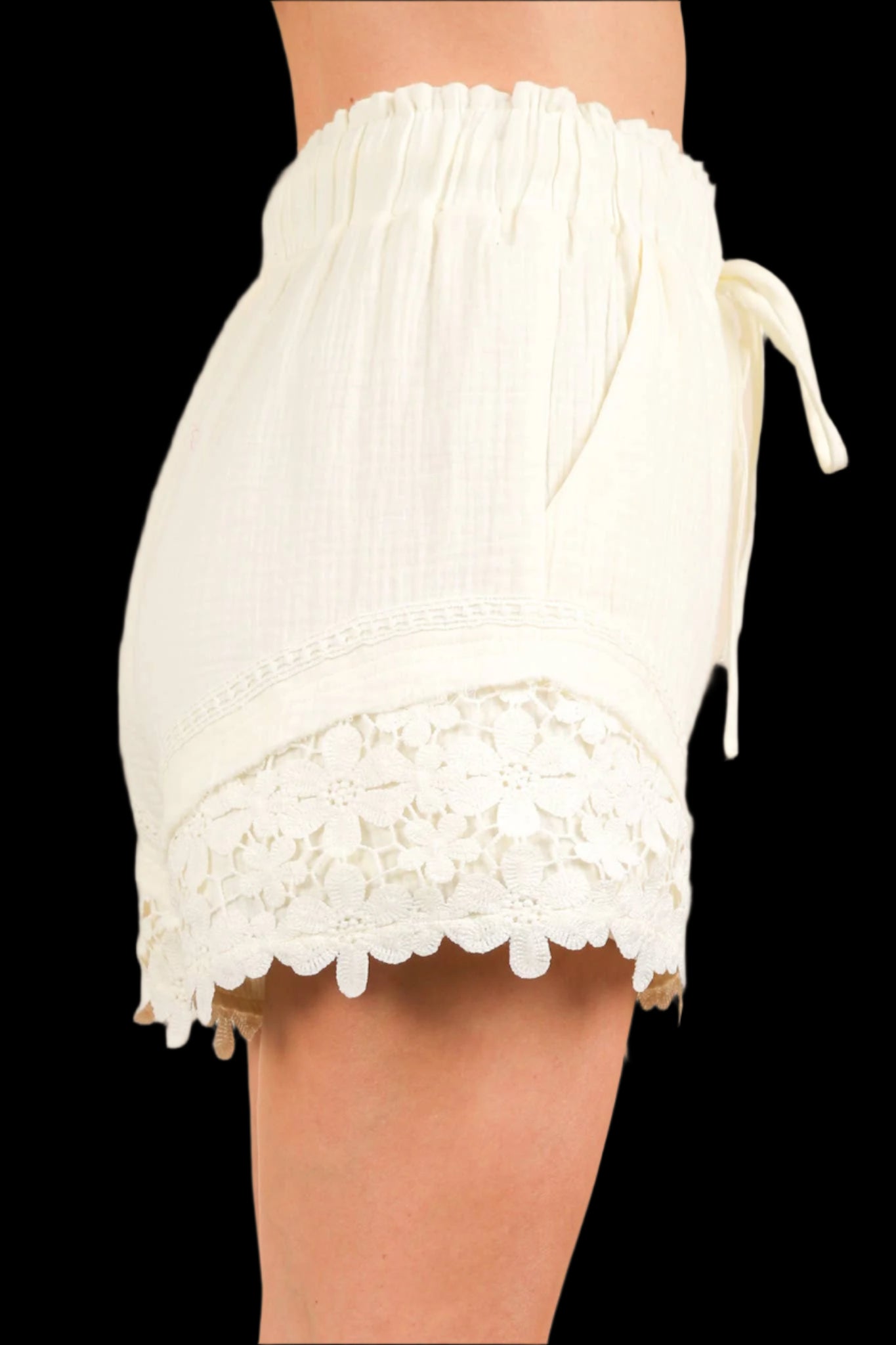 Laced Intentions Shorts featuring lace contrast hem and ruffled waistband, perfect for summer comfort and style.