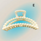 Elegant Pearl Perfection Hair Clip with imitation pearl embellishments, perfect for adding sophistication to any hairstyle.