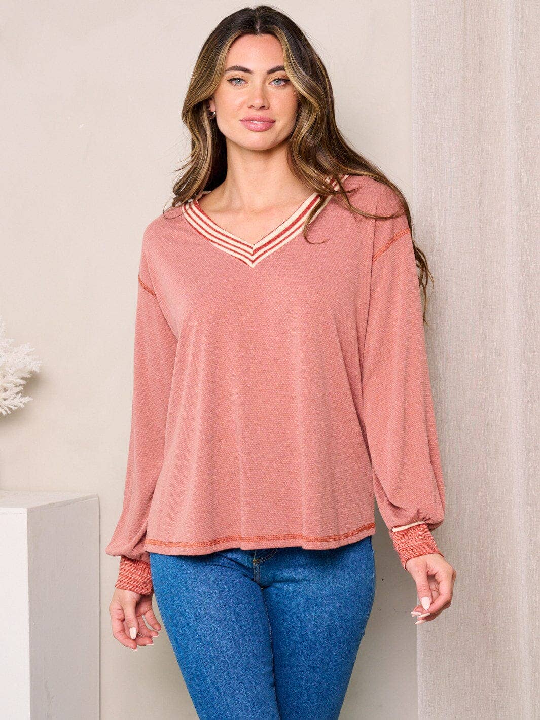 Stylish Women's Long Sleeves V-Neck Top | Trendy Comfort by IWT Brands $21.50 Discover boutique fashion with our TY10841PA long sleeves V-neck top. Designed for comfort and style, this trendy piece is perfect for any wardrobe. Teal Tiger Boutique