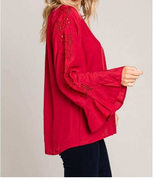 Red Rayon blend top with bell sleeves and eyelet detailing from Cotton Blue, perfect for the holidays.