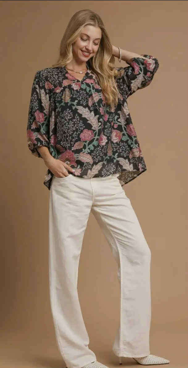 Model wearing the FOREVERMORE TOP - Umgee with floral print, relaxed fit, and puff sleeves against a neutral background.