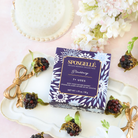 Spongelle Private Reserve Blackberry sponge with floral accents for luxe bathing and rejuvenation.