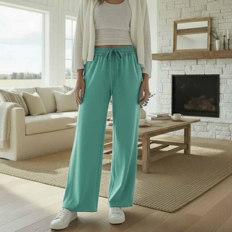 AQUA DRIFT WIDE LEG PANTS displayed indoors; relaxing outfit in soft sea green mineral wash.