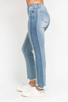 JUDY BLUE - HADLEY JEANS featured in a side view, showcasing high-rise fit, side panel detail, and hi-lo fray hem.