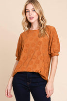 Field of Daisies Top in copper color, featuring puff sleeves and textured daisy embroidery, perfect for spring fashion.