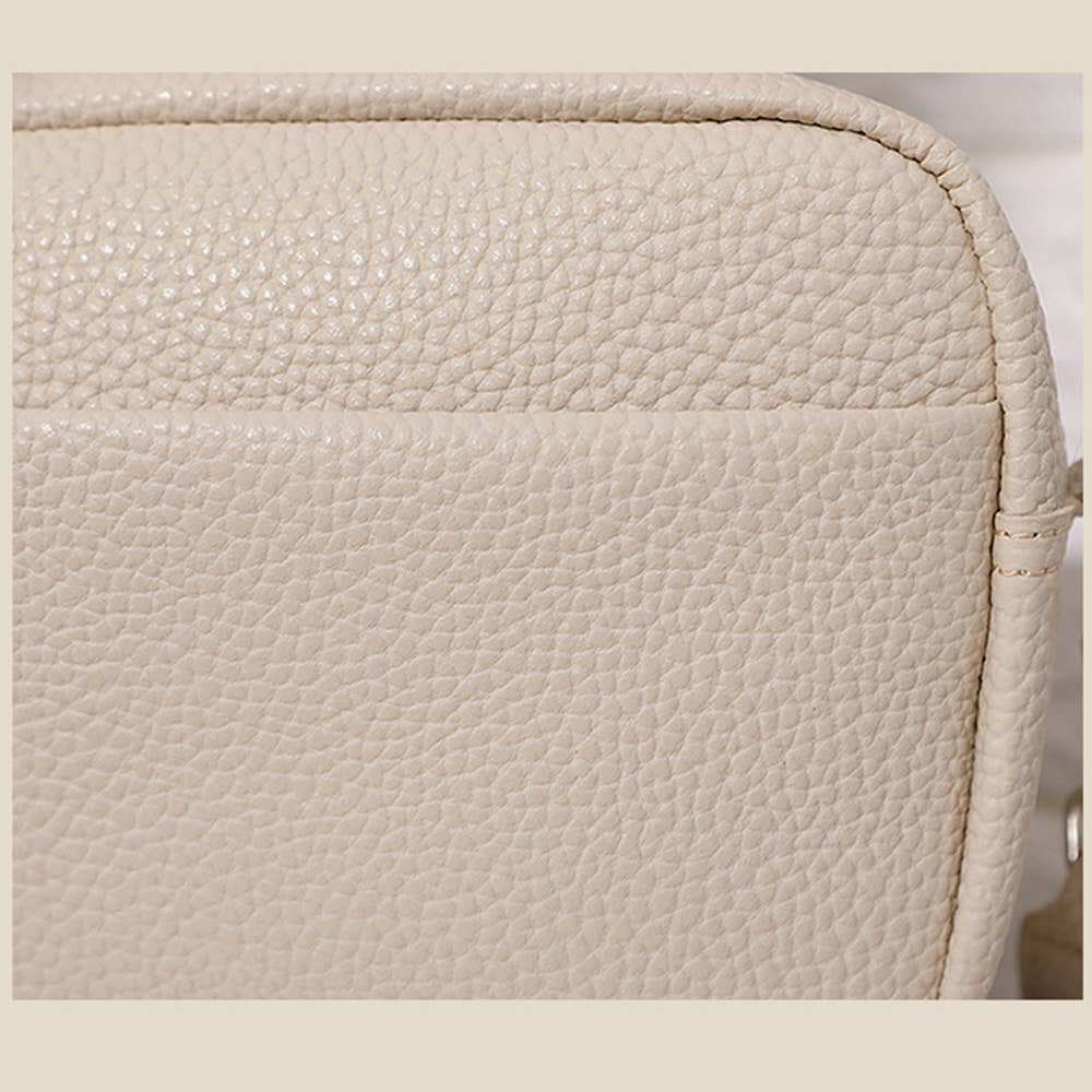 Beige PU leather texture of SAMANTHA Crossbody Bag showcasing its durable and stylish material.