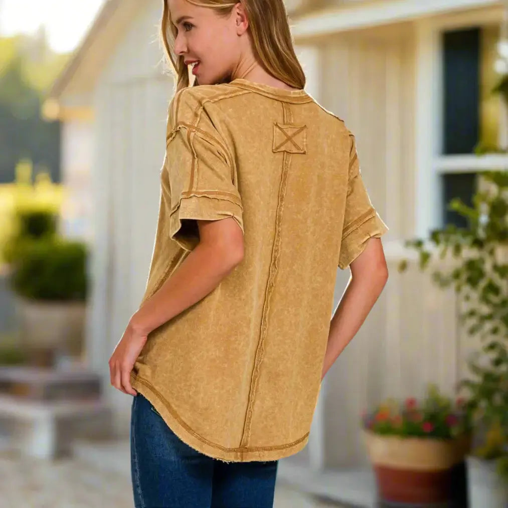 Back view of Golden Trail Top in Dark Toffee, featuring raw edges and a stylish patch detail.