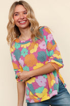 Cheerful floral patterned Happy Daze Top by Haptics, perfect for summer to fall transition, featuring a cozy waffle knit.