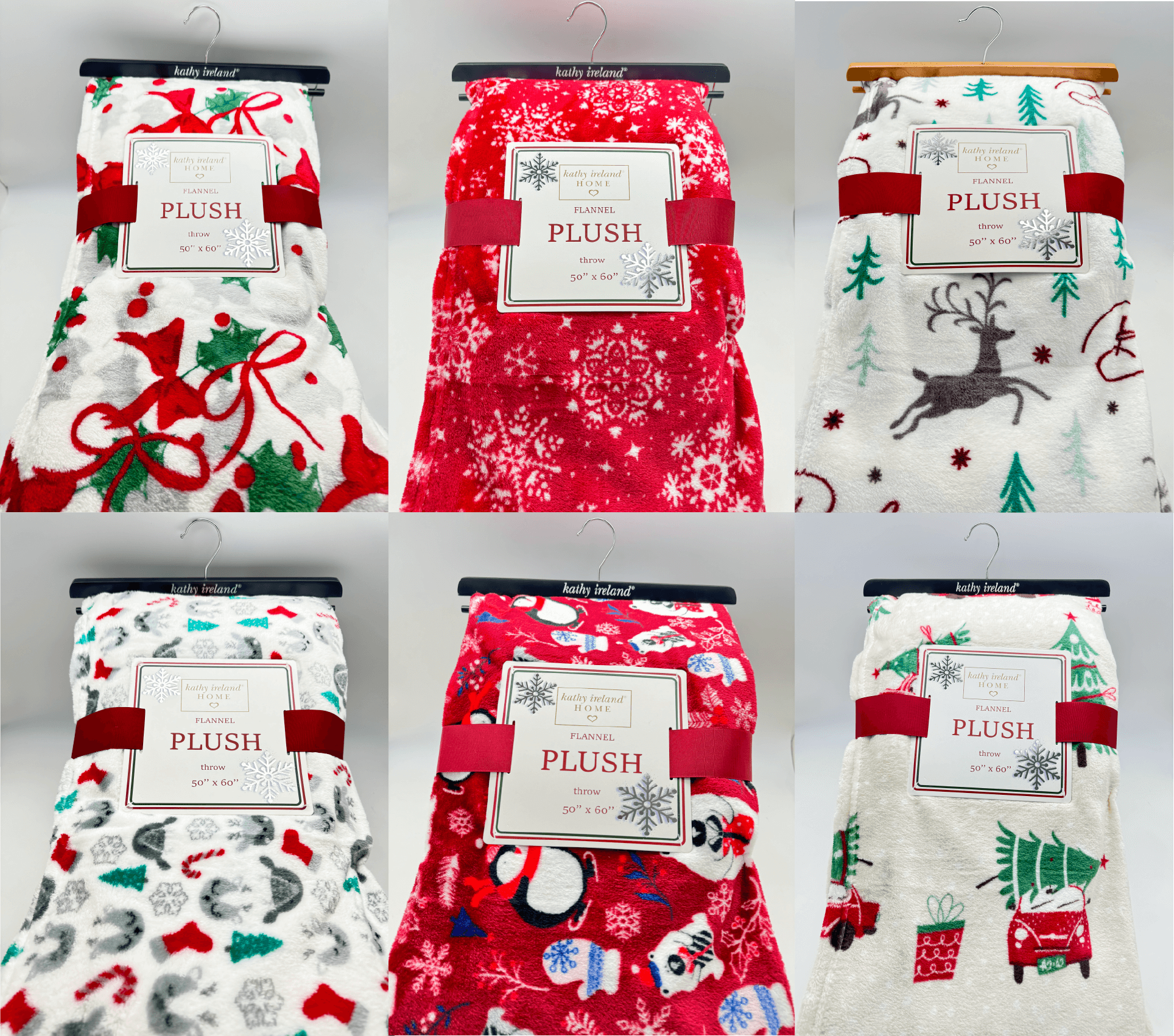 Kathy Ireland Christmas Cheer Plush Throw Blankets with festive holiday designs and ultra-soft fleece material displayed on hangers.