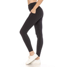 Woman wearing black MOVE YOURSELF LEGGINGS from Fit USA, showcasing comfortable fit and style for gym, yoga, or casual wear.